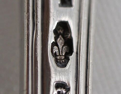 Serving spoon, silver, 18th century, straight thread pattern.