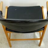 Danish armchair in oak and black leather