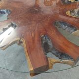 Round table carved from a wooden slice of PADOUK