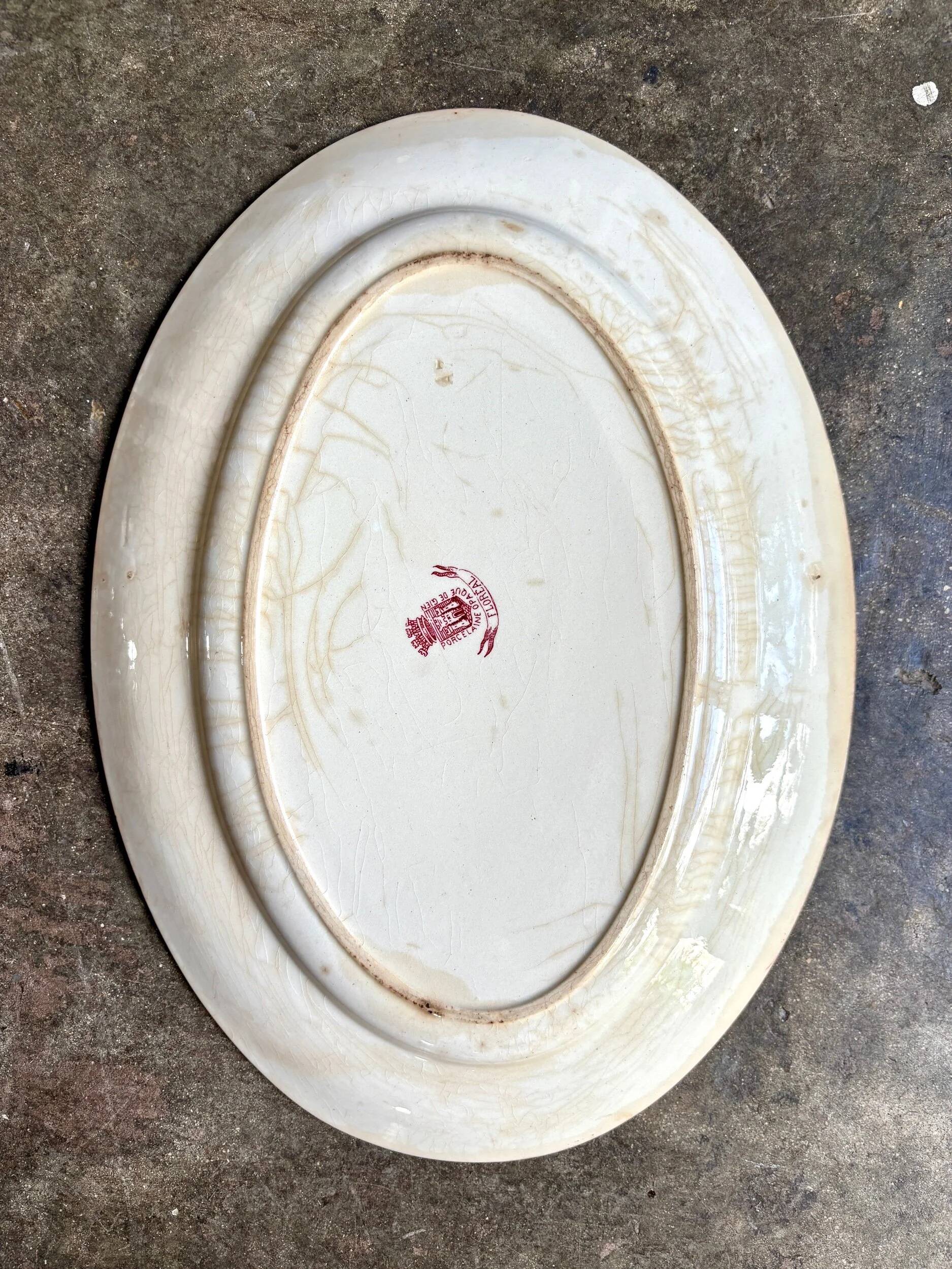 Gien oval dish in pink ironstone, "Floreal" service