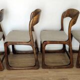 Set of 4 vintage Baumann "Sled" chairs in bent wood.