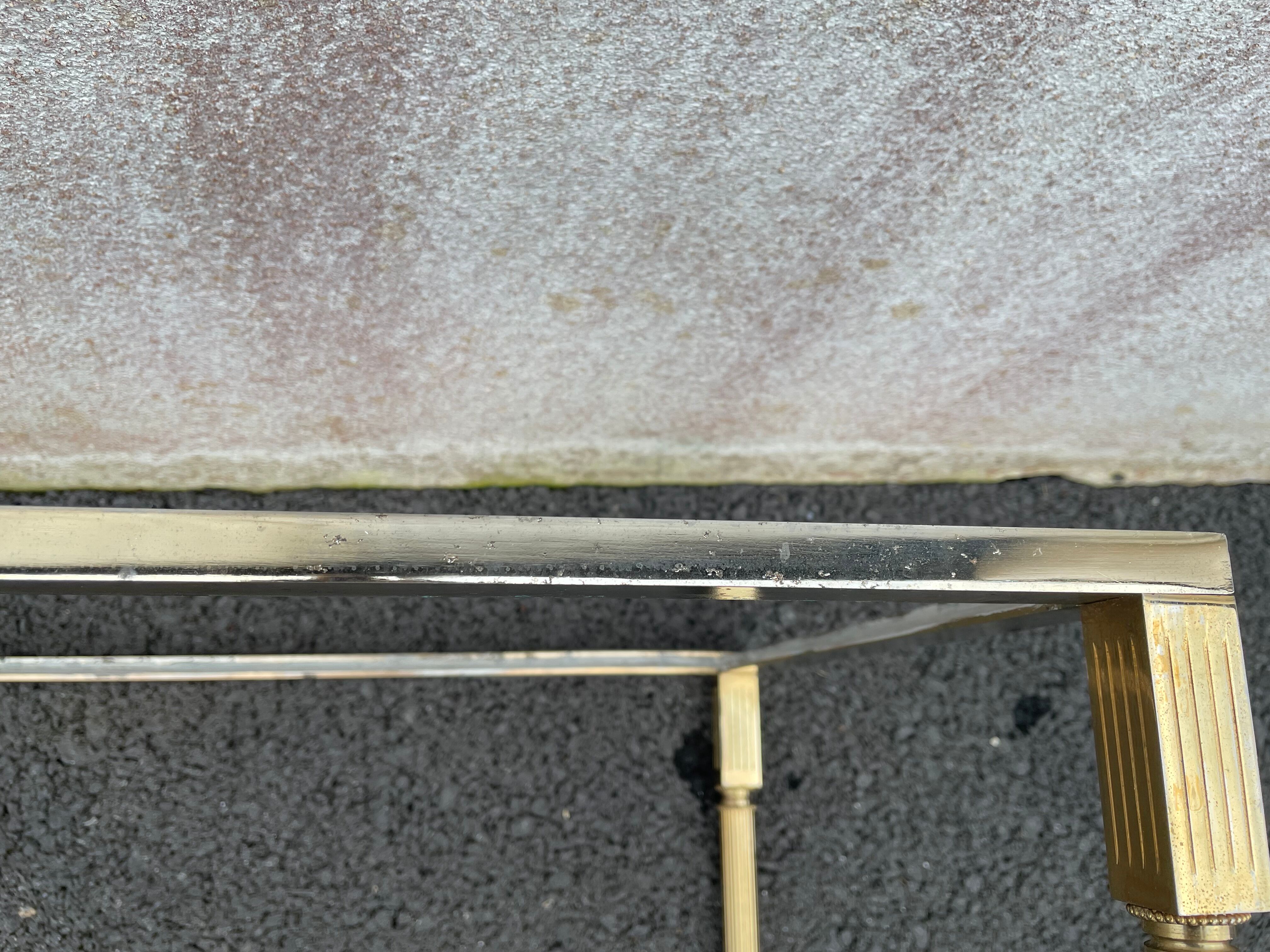 Coffee table in gilded brass and veined green marble