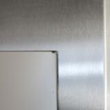 Miroir "space age". Acier inoxydable. France, circa 1970