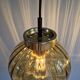 Set of 3 amber glass pendant lights, RAAK Amsterdam, 1970