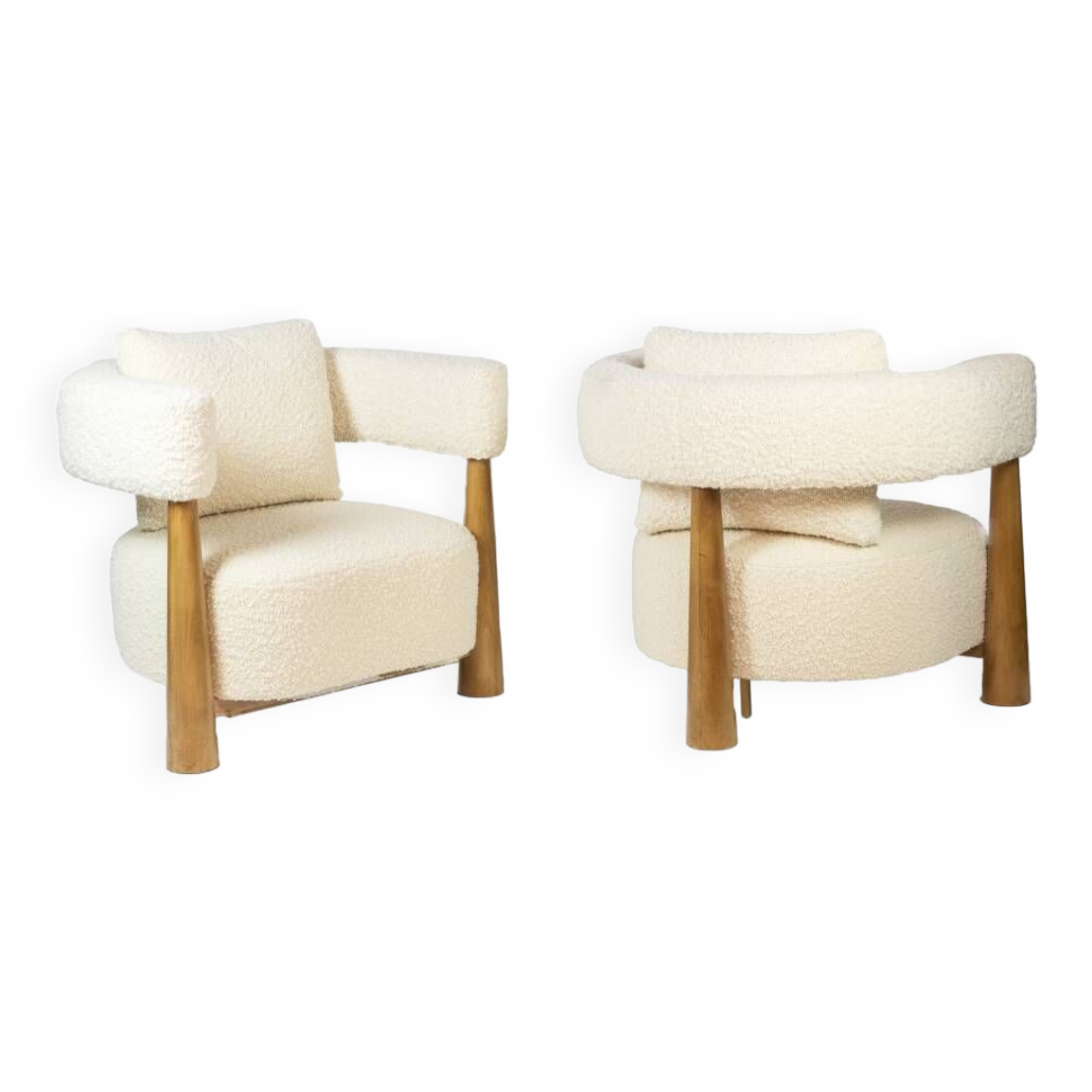 Pair of “bean” shaped armchairs, in blond beech. Contemporary work.