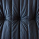 Armchair and ottoman in black leather model designed by Michel Ducaroy 1973