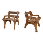 Pair of brutalist teak armchairs
