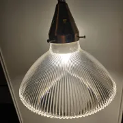 Vintage globe-style holophane on a chrome stem.