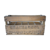 Old wooden crate for milk bottles