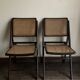 Paire de chaises pliantes cannées 1960