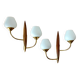Pair of wood and gilded brass sconces 1950 boat hulls with 2 lights.
