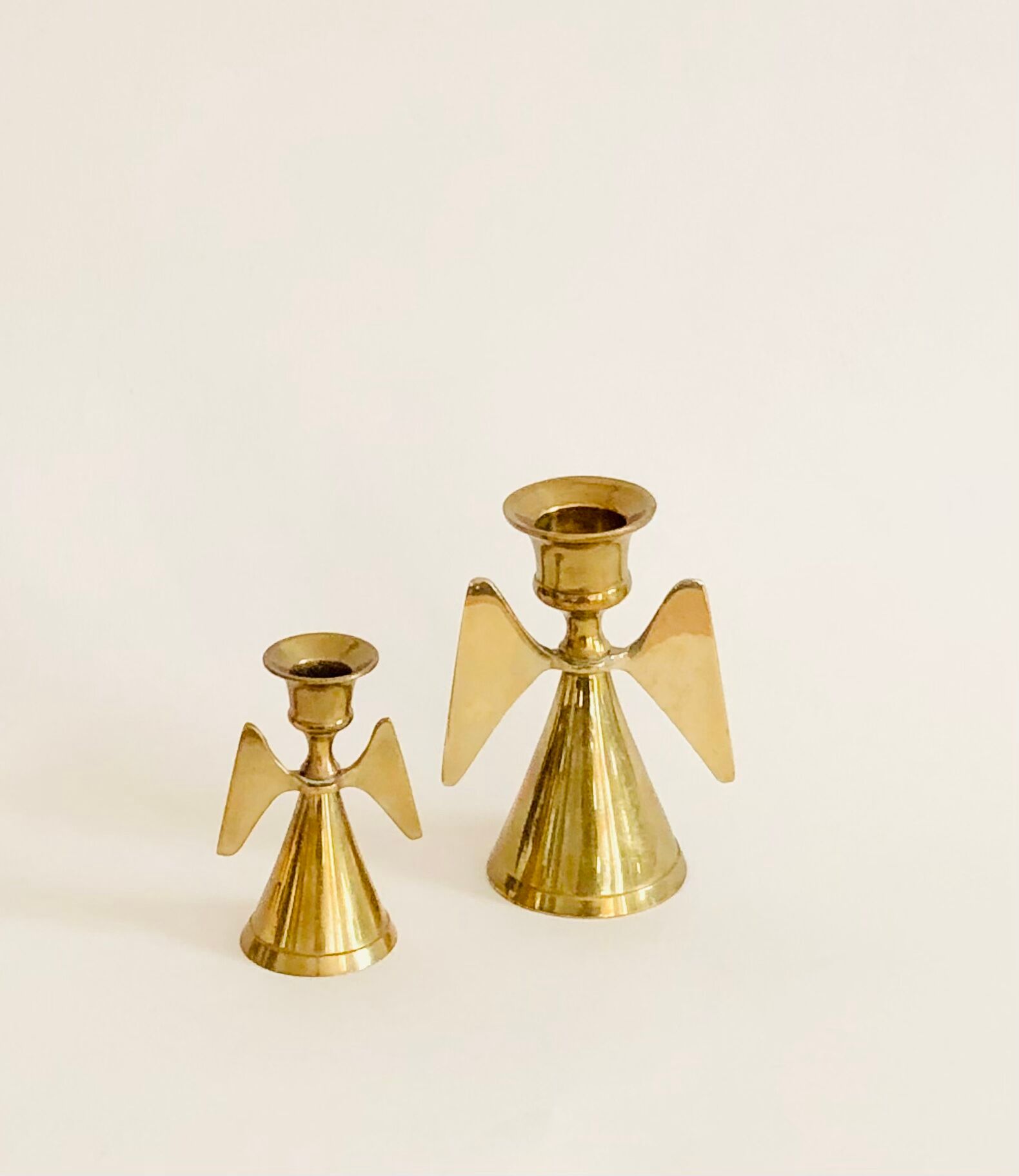 Duo of brass angel candle holders