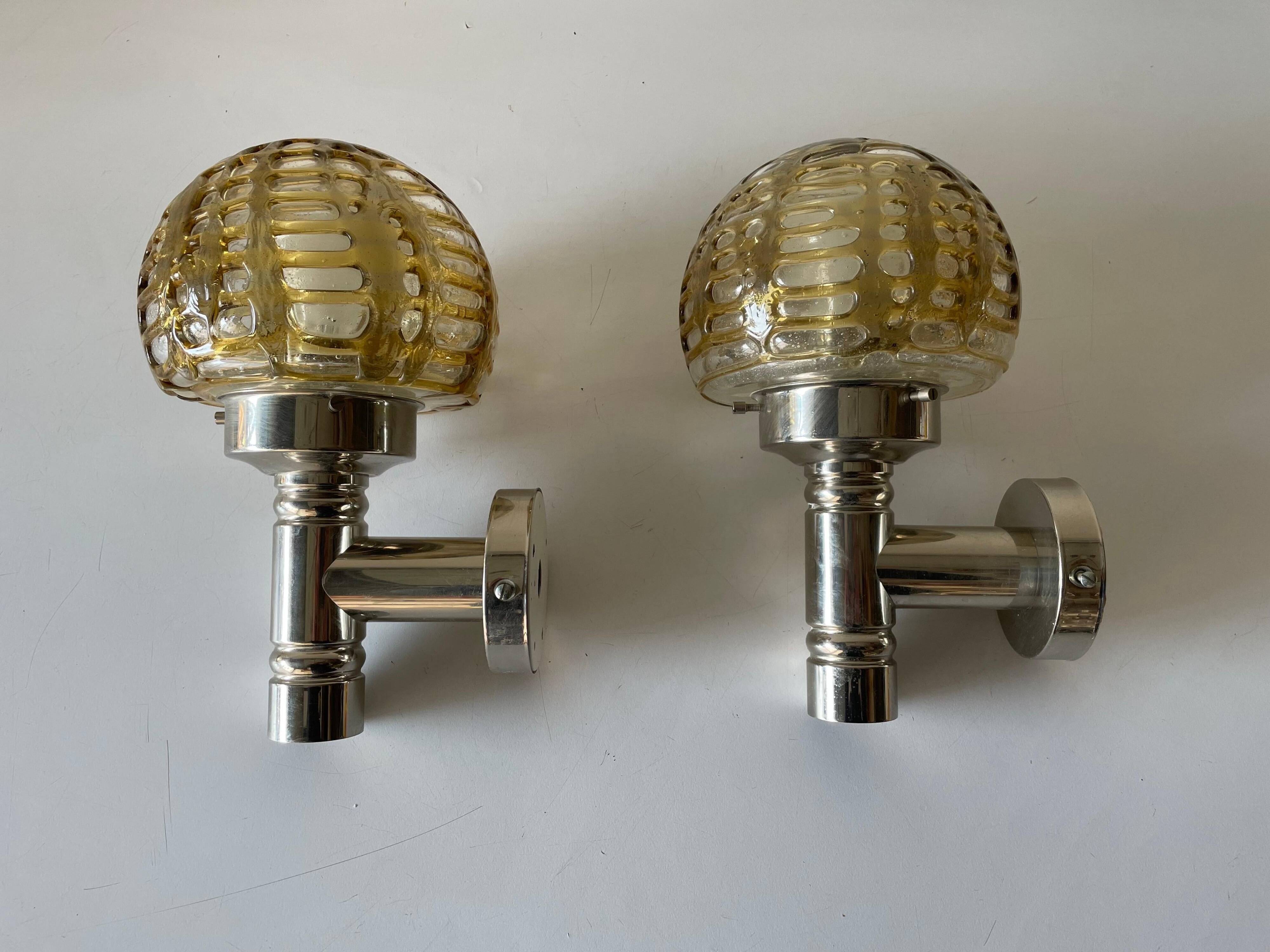 Rare pair of blown glass and chrome wall lights by Doria, 1960s, Germany.
