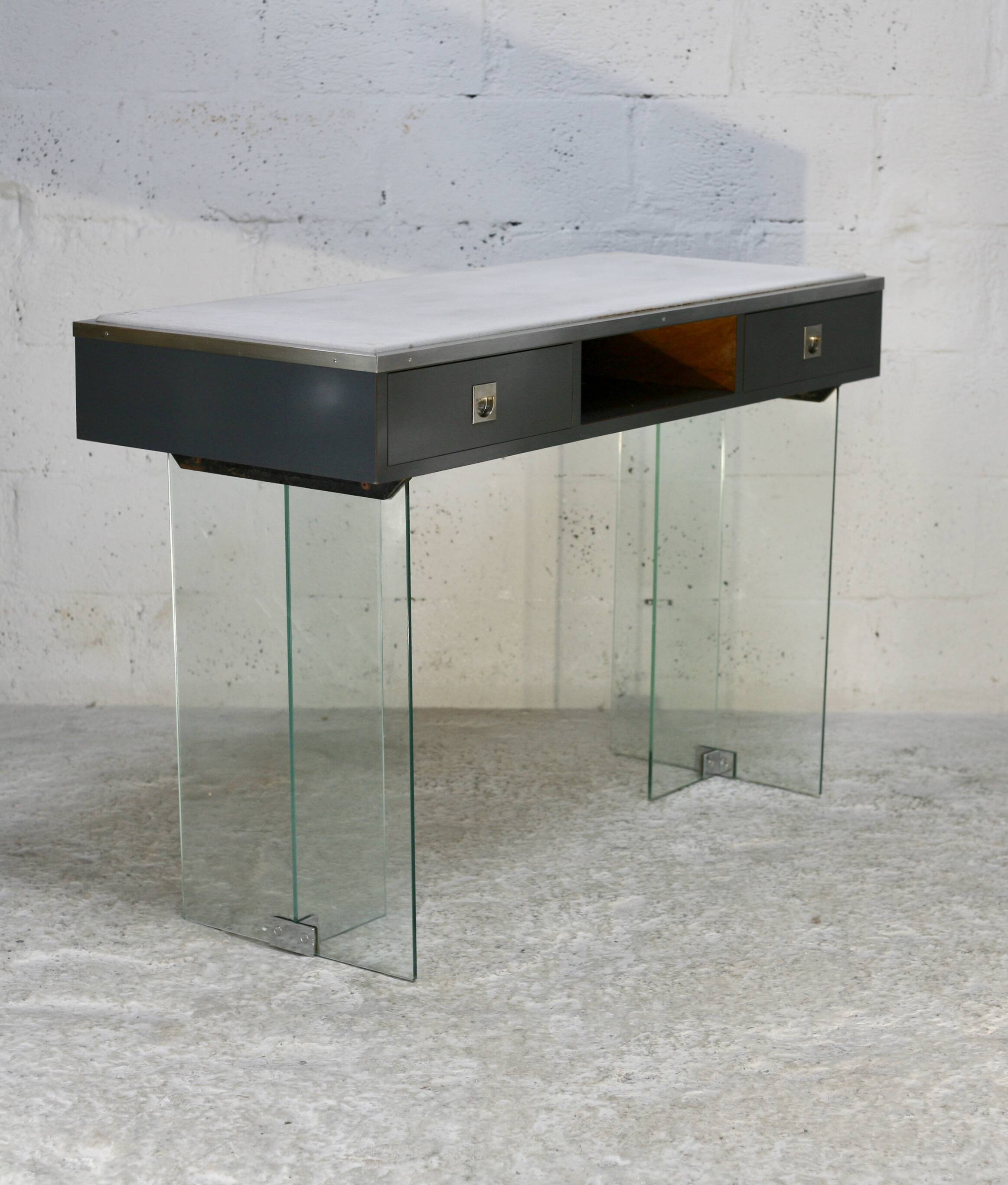 Modernist console, 1960s, glass base, wooden and fabric top.