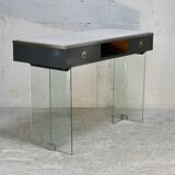 Modernist console, 1960s, glass base, wooden and fabric top.