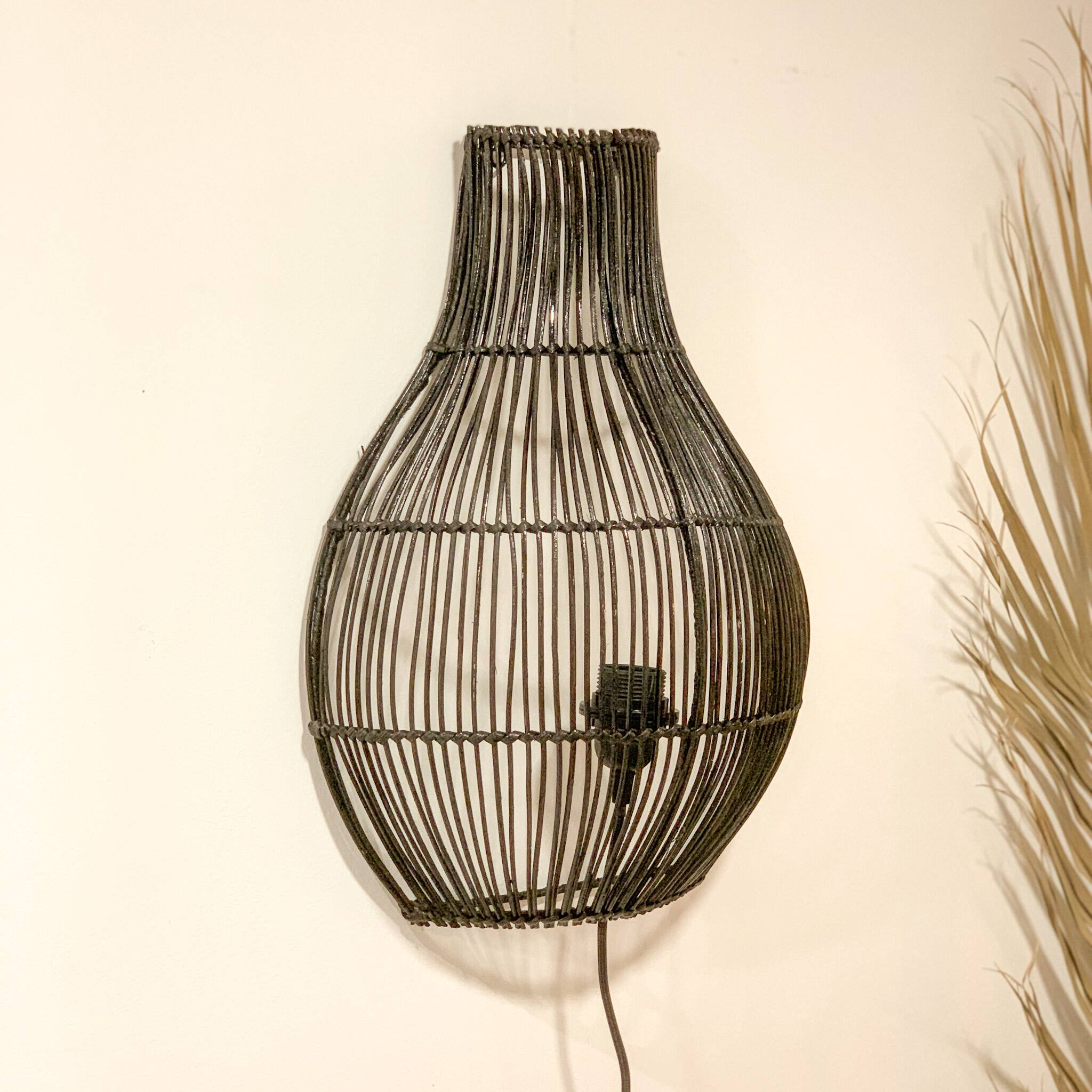 Black rattan wall light