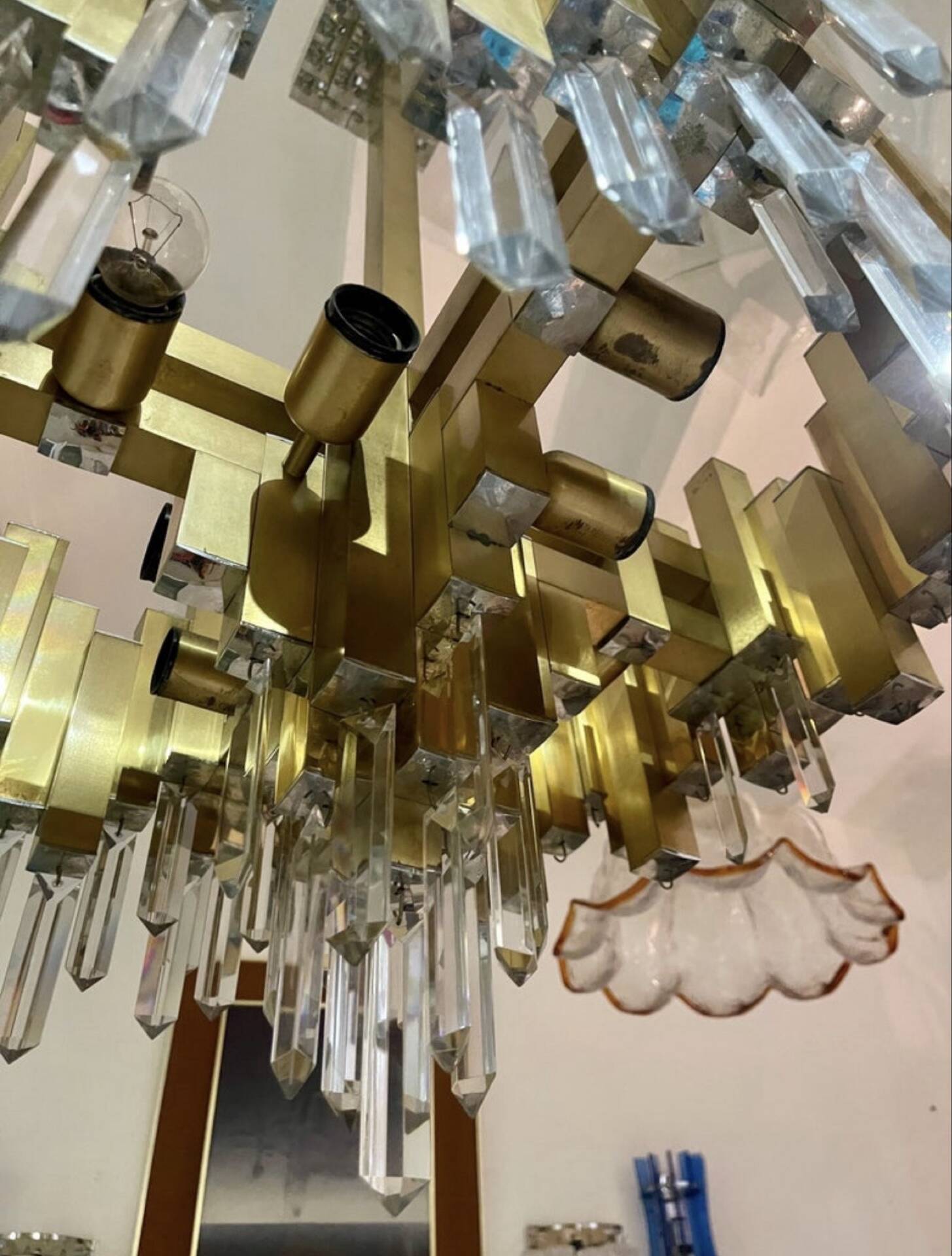 Rare 1970s Lumica chandelier in brass and crystal.
