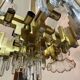Rare 1970s Lumica chandelier in brass and crystal.