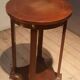 Varnished round gueridon
