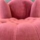 Fauteuil crapaud rose capitonné