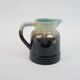 Art Deco pitcher in black, brown and blue glazed ceramic