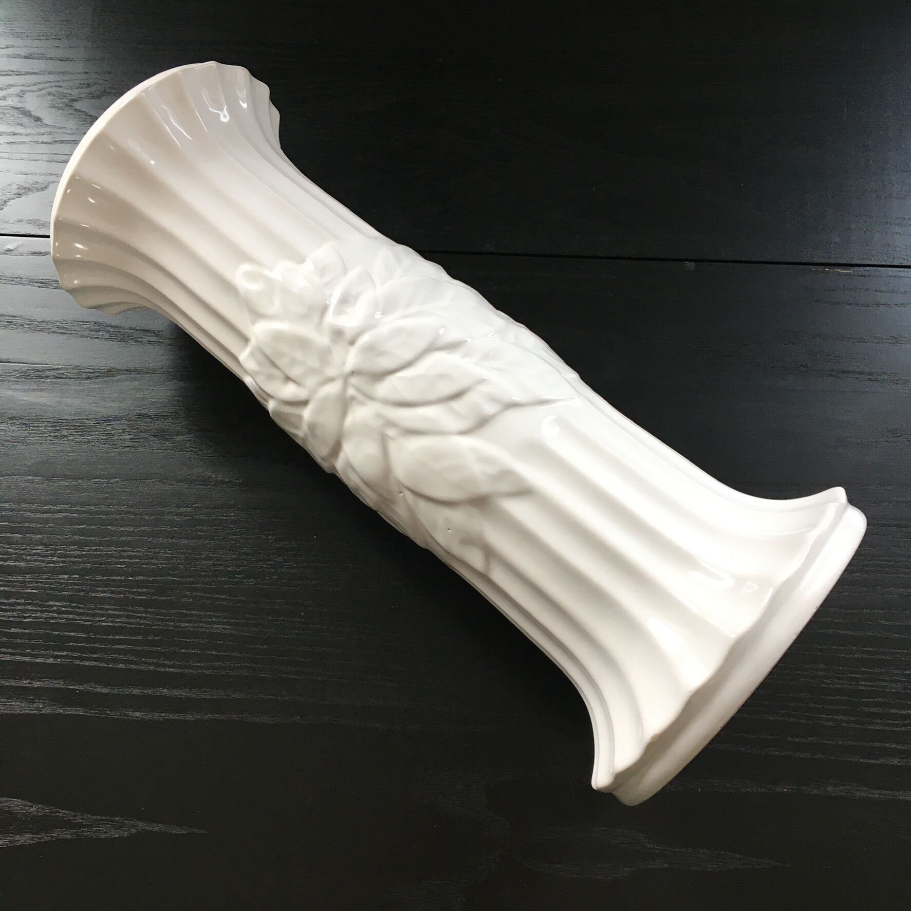 Earthenware column with floral decoration