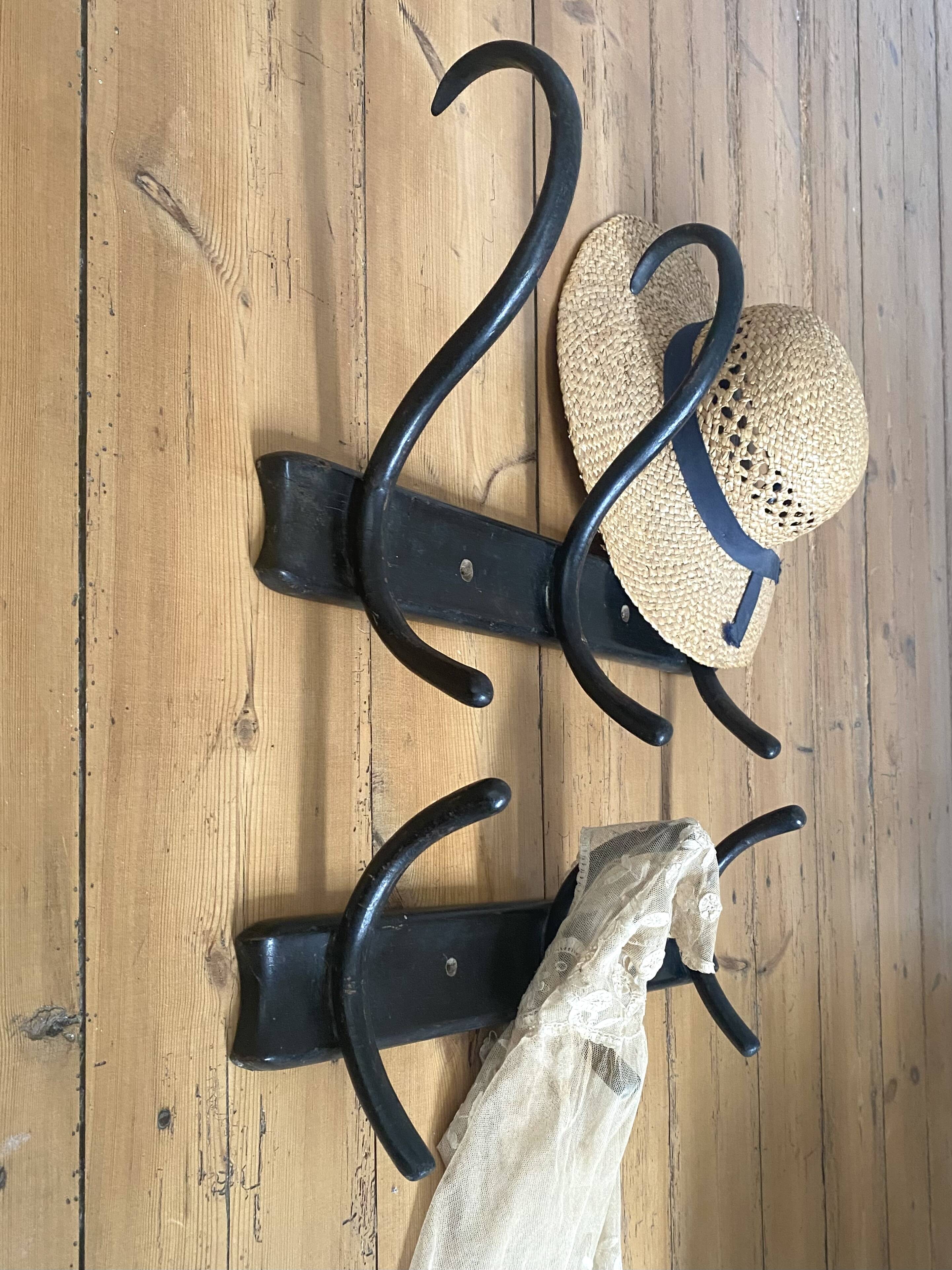 Old black curved wooden coat rack