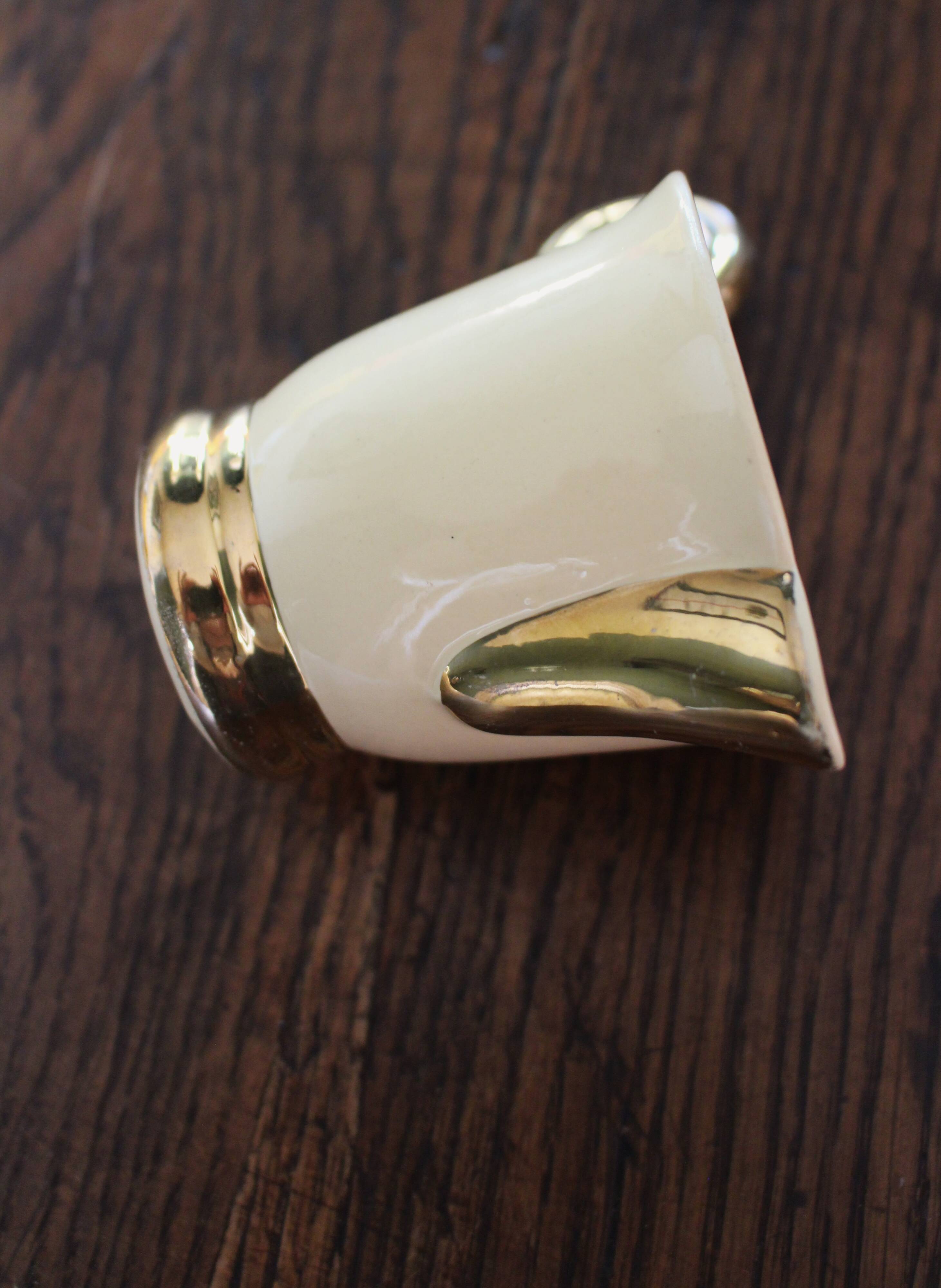 Ecru ceramic milk jug with gold decoration from Sarreguemines.