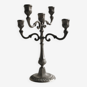 Antique four-branched candlestick.