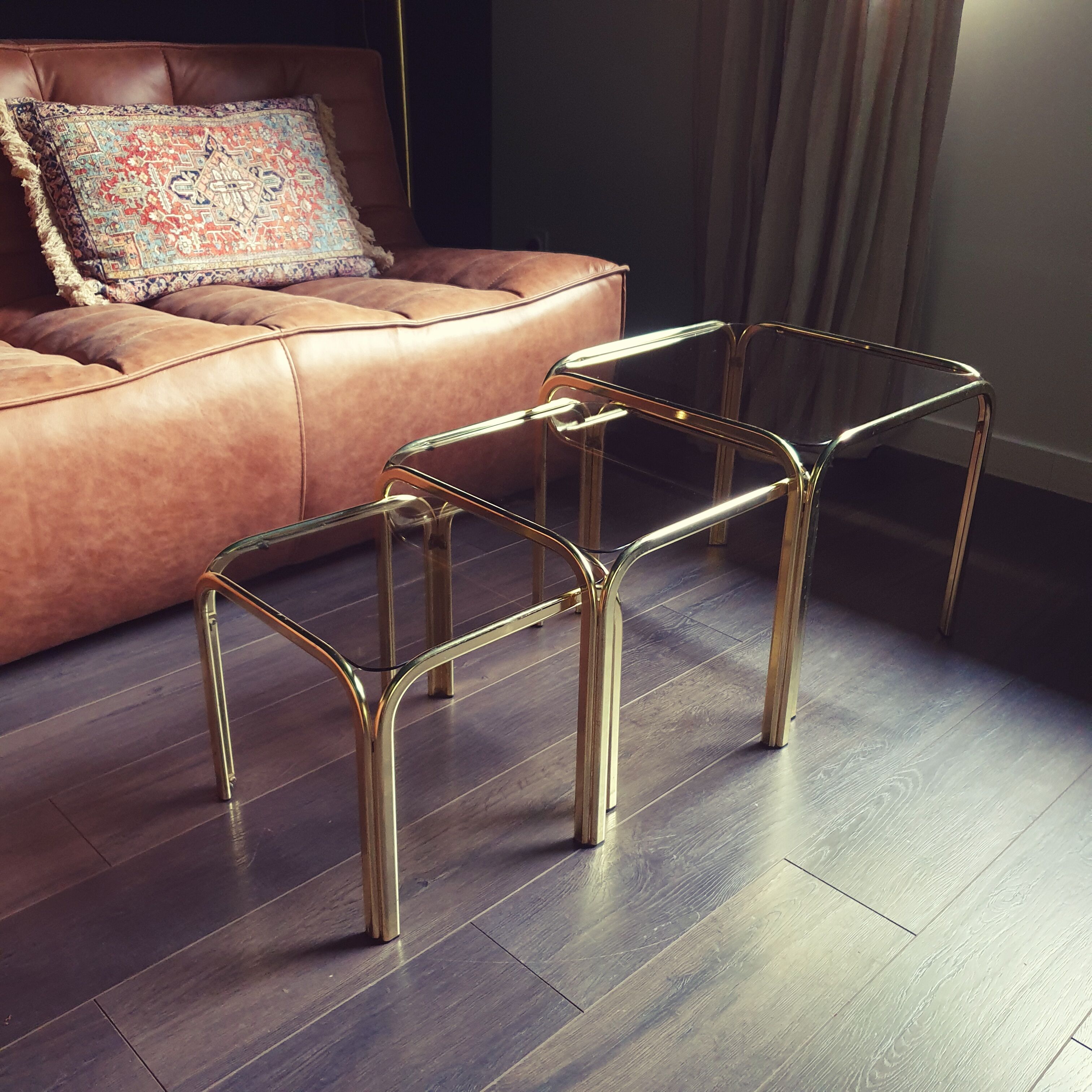 Golden vintage pull-out coffee tables and 70s smoked glass