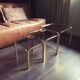 Golden vintage pull-out coffee tables and 70s smoked glass
