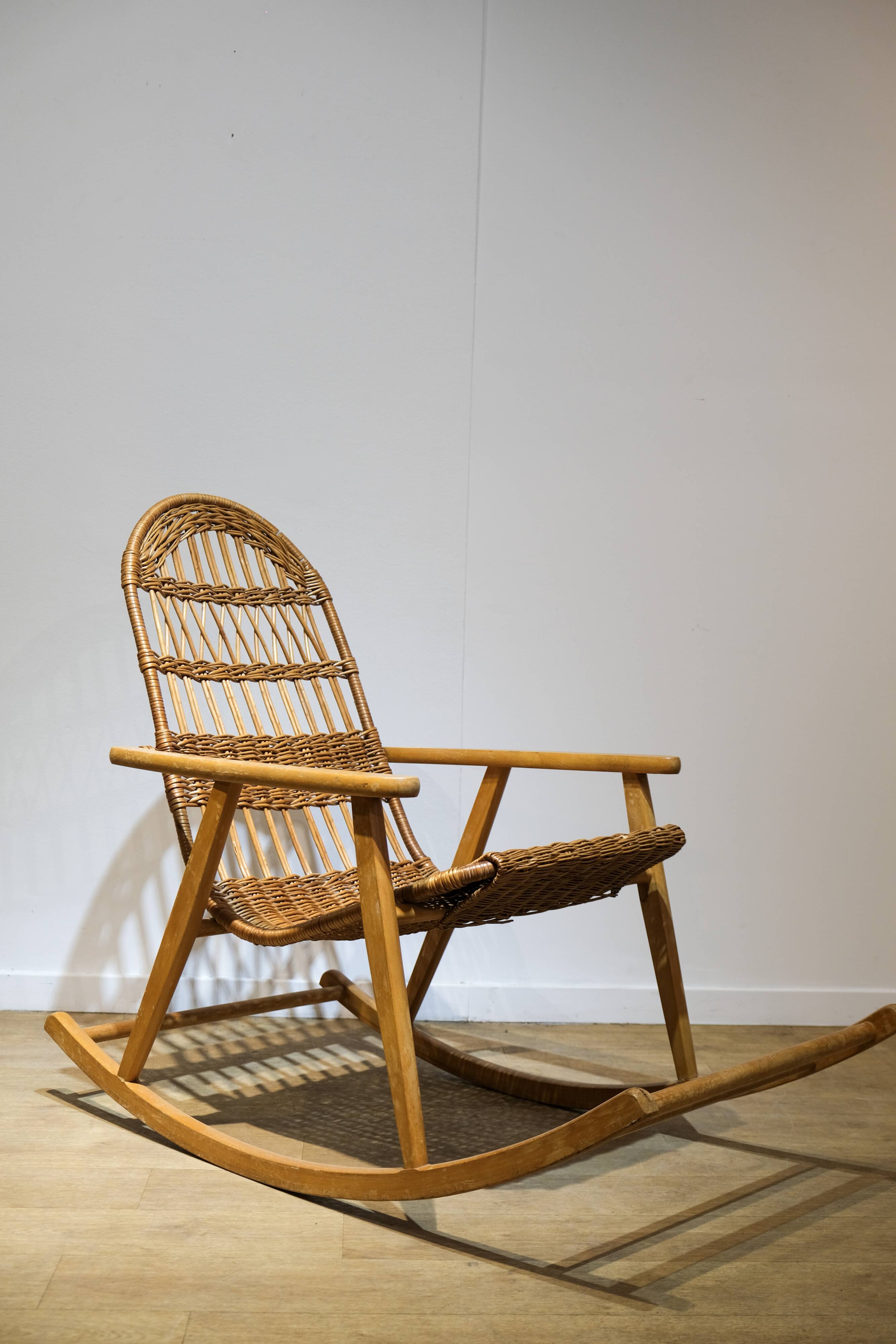 Wicker and wood rocking chair
