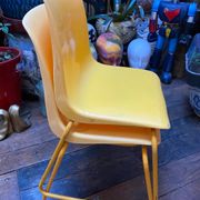 Duo of vintage Grofilex child kindergarten chairs yellow plastic