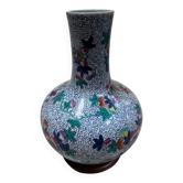 CHINA Polychrome porcelain vase decorated with butterflies Signed under the base 43cm