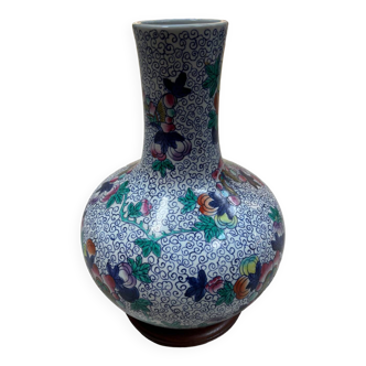 CHINA Polychrome porcelain vase decorated with butterflies Signed under the base 43cm