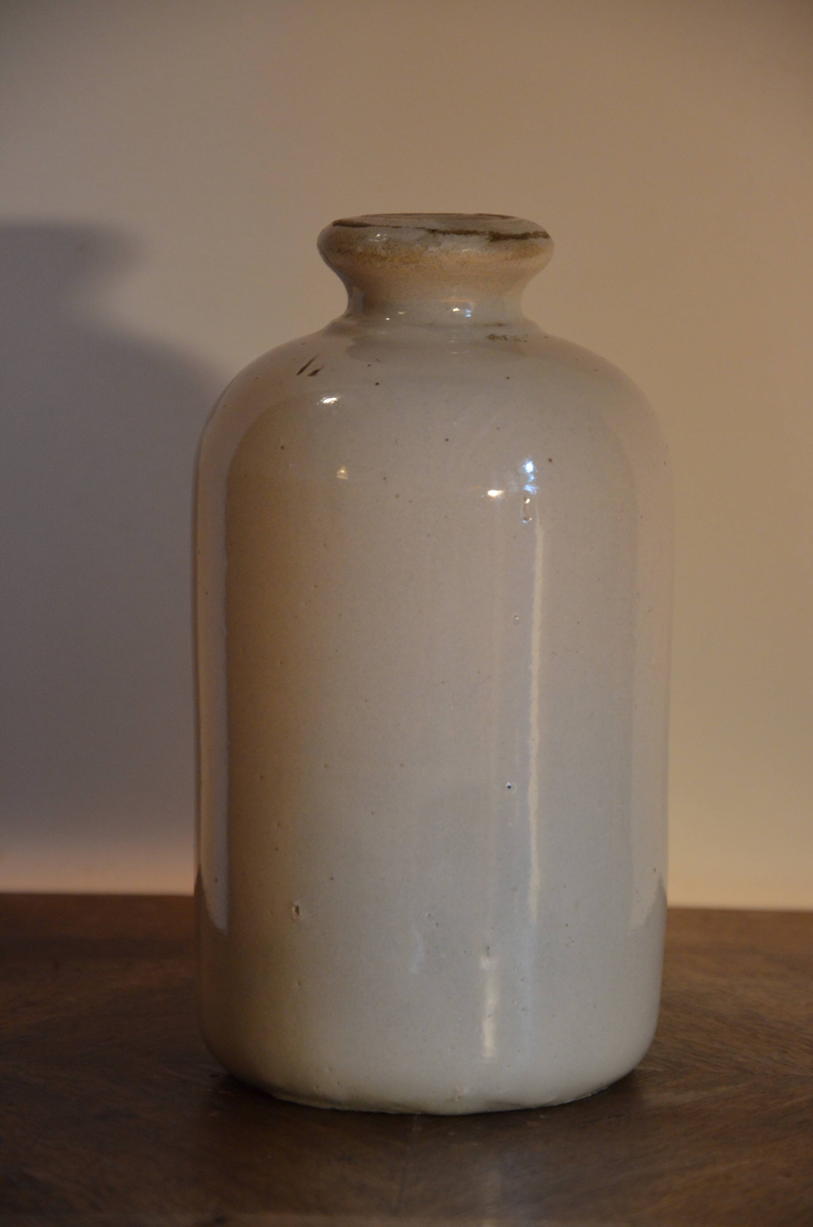 Off-white ceramic soliflore bottle