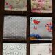 A set of 6 mismatched floral and bird-themed napkins