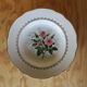 6 vintage plates with central pink