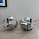 "Space Age" pair of chrome metal wall lights - 1960