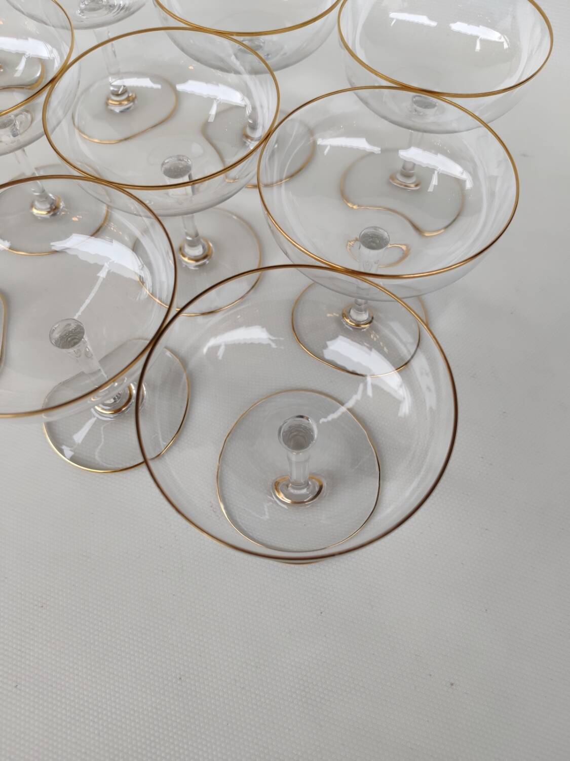 12 Baccarat crystal champagne coupes, circa 1900.