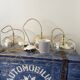 Set of three new electrified golden glass pendant lamps