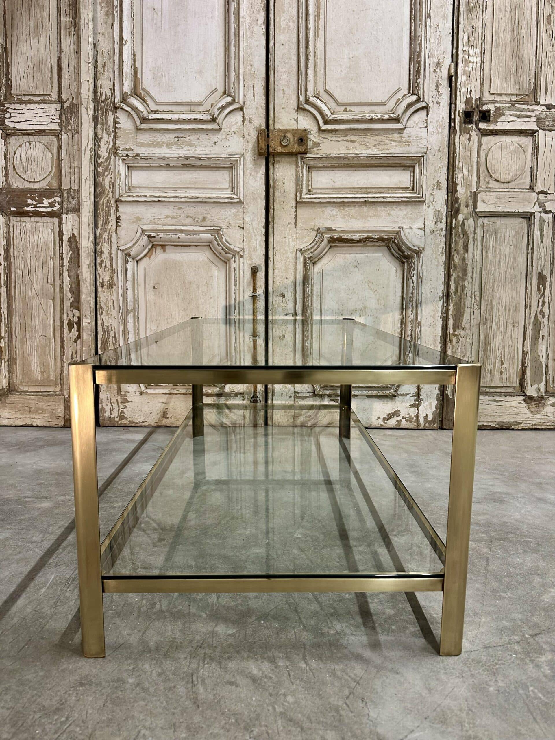 Table basse à double plateau en bronze attribuée à Jacques Quinet