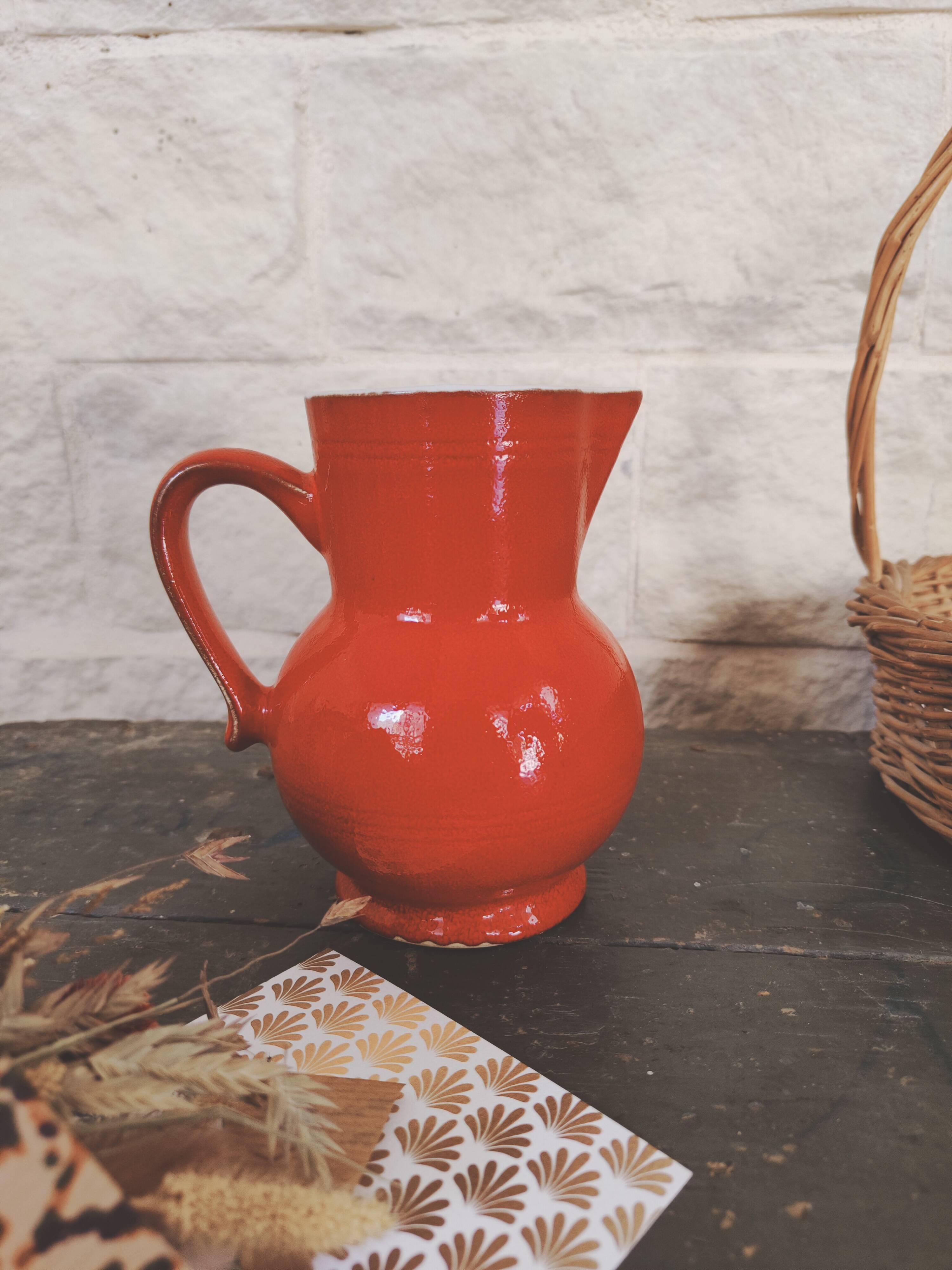 Small red enameled ceramic pitcher Emile Henry