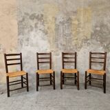 4 wooden and straw chairs