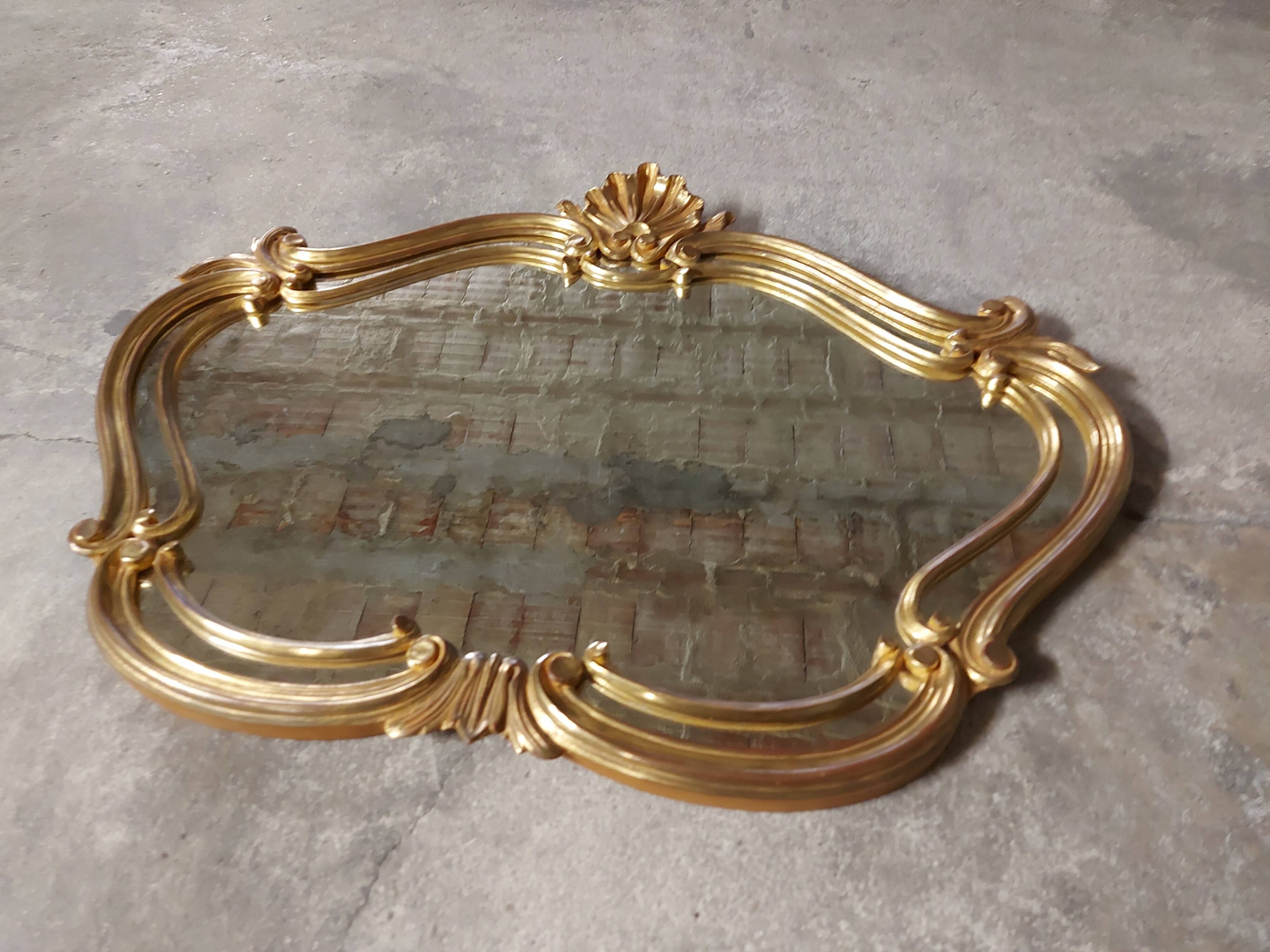 Old gilded wood mirror