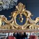 Italian mirror from the Napoleon III period in painted and gilded wood