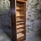 French antique wardrobe with curtain in oak, circa 1920–1930.