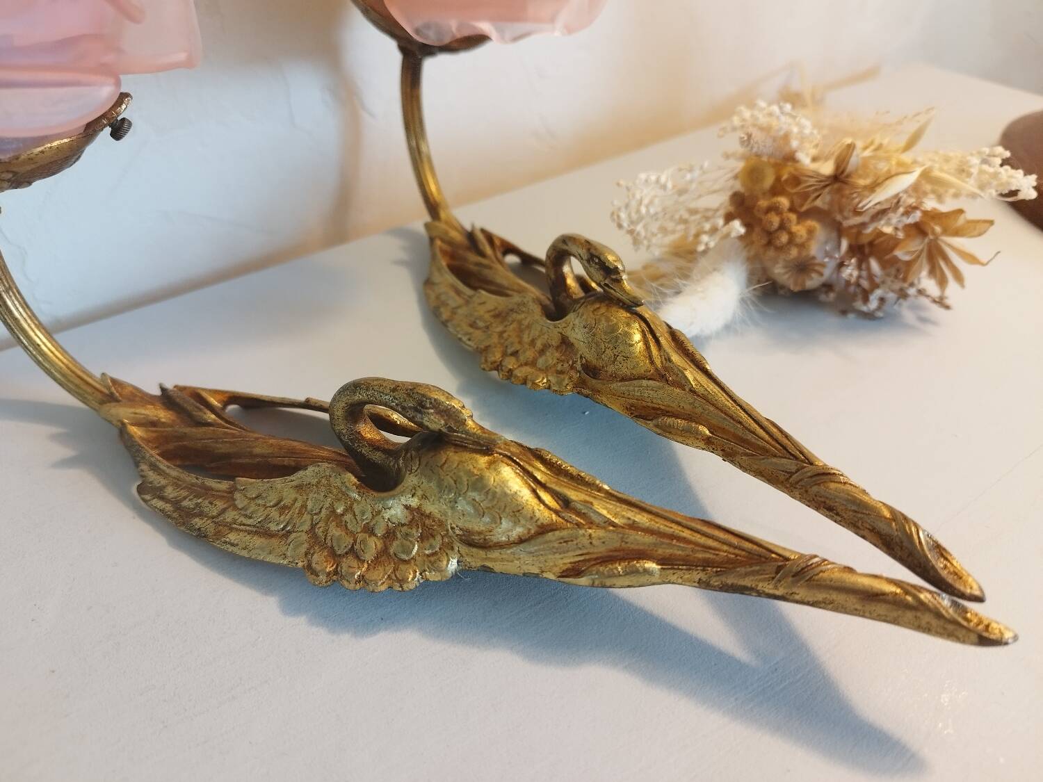 Pair of bronze swan and pink tulip wall lights in glass paste