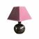 Ceramic floor lamp with a pyramidal shade and square base.