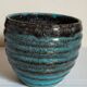 Ceramic planter with speckled enamel gadroons from the 1940s